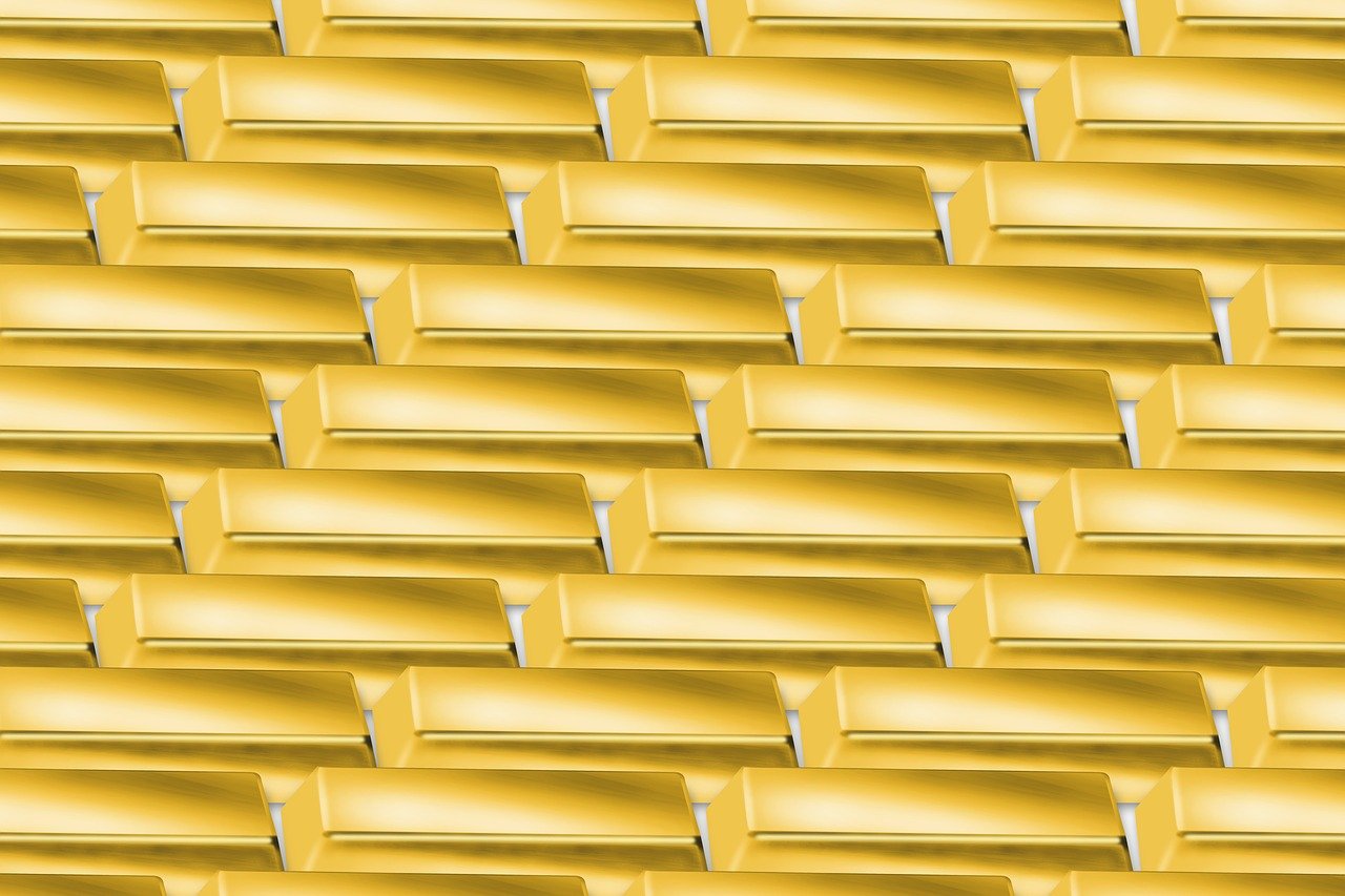 Gold Stays Steady as a Softer Dollar Offsets Eroding Rate-Cut Expectations